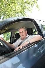 elderly man driving